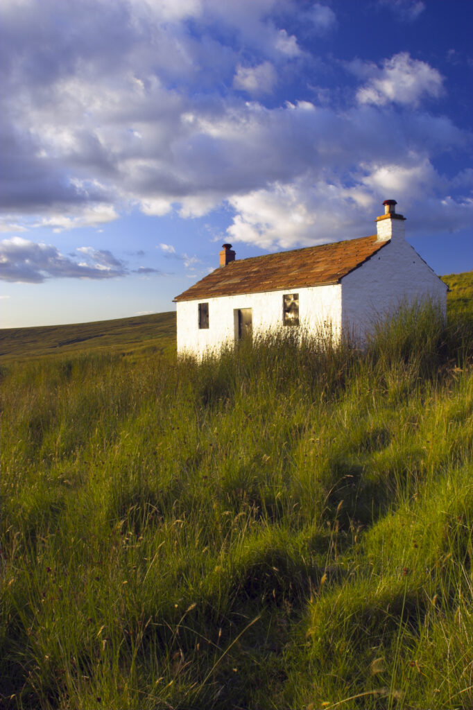 England, Cumbria, Hartside. A small cottage located within the barren landscape of Hartside Pass near Alston.