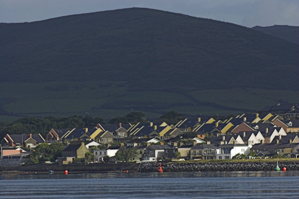 Ireland County Kerry Dingle Peninsula The town of Dingle against a backdrop of mountains viewed from Dingle Bay
