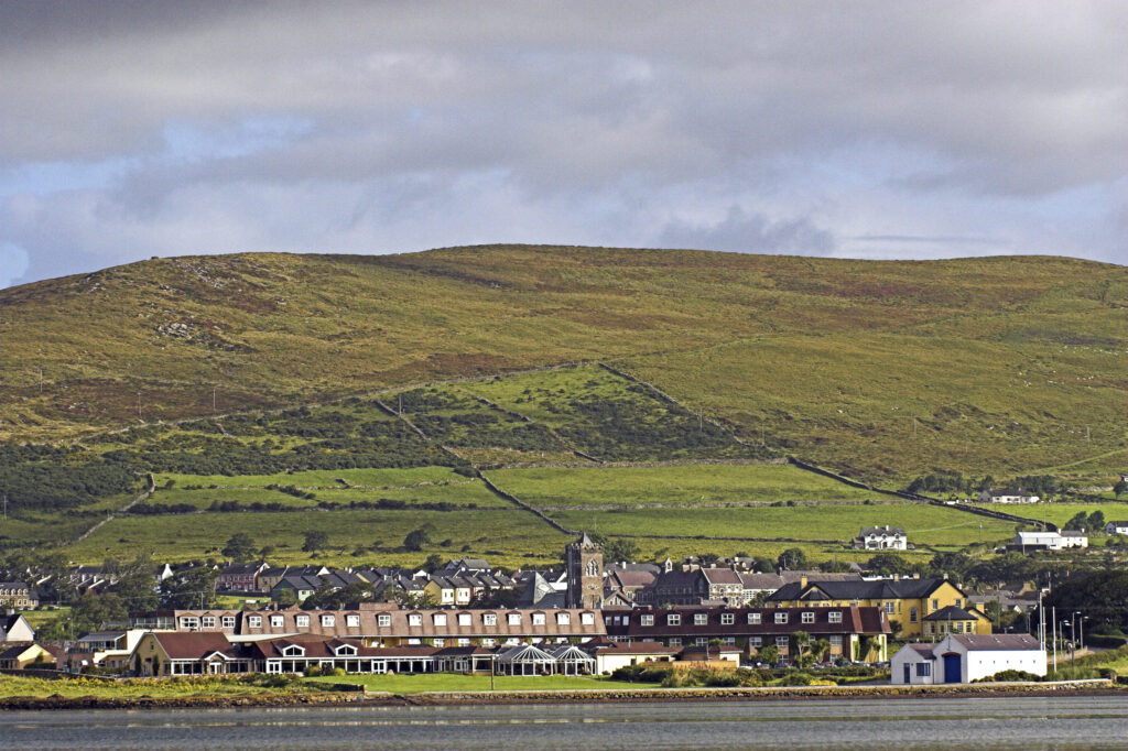 Ireland County Kerry Dingle Peninsula The town of Dingle against a backdrop of mountains viewed from Dingle Bay
