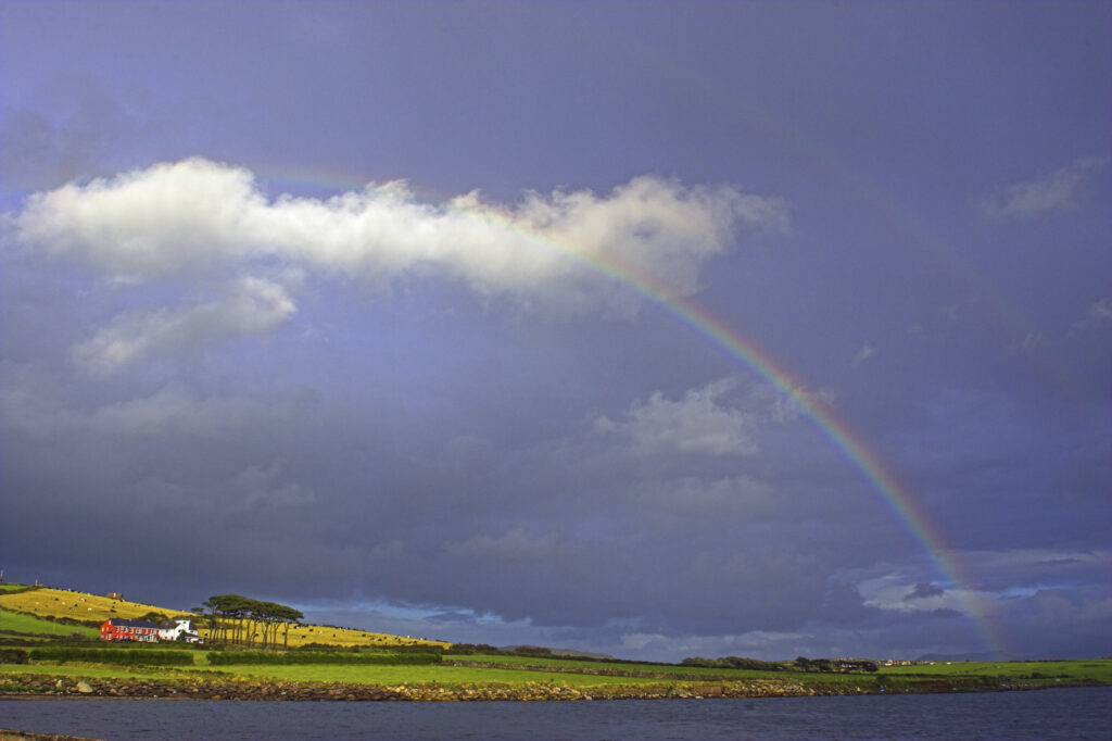 Ireland County Kerry Dingle Peninsula A rainbow follows a storm over Dingle Bay in the Dingle Peninsula
