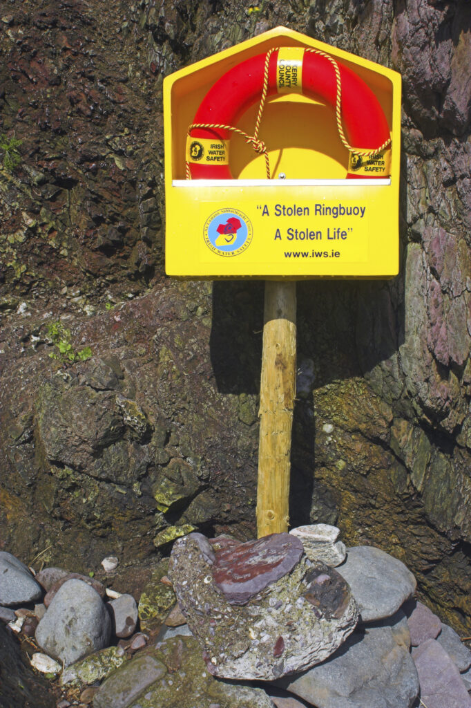 Ireland County Kerry Dingle Peninsula A life saving ring on a small beach in Dingle Bay on the Dingle Peninsula