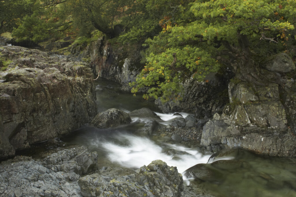 ENGLAND Cumbria Lake District National Park The fast flowing waters of the Gallen Force near Stonethwaite