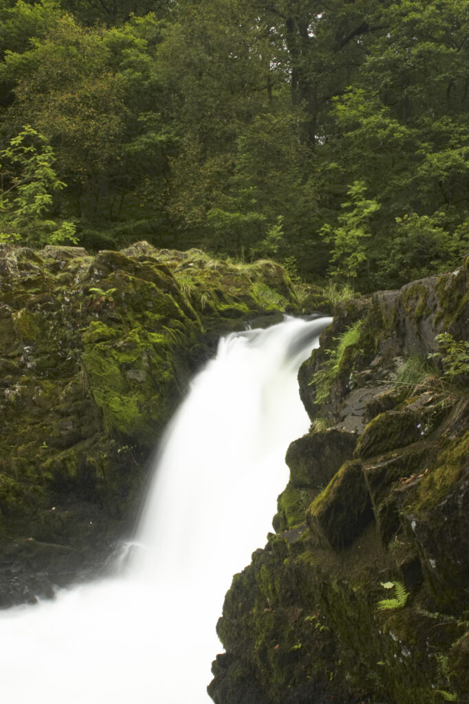 England, Cumbria, Lake District National Park. The fast flowing cascades of Skelwith Force near Skelwith Bridge.