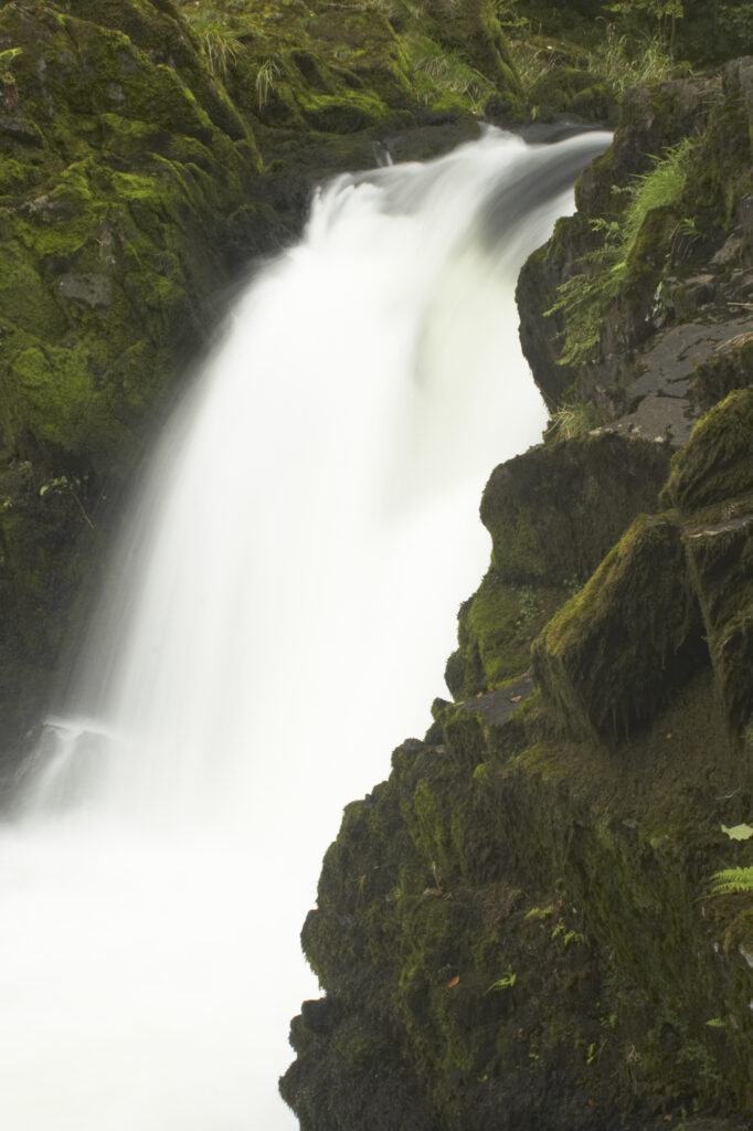 England, Cumbria, Lake District National Park. The fast flowing cascades of Skelwith Force near Skelwith Bridge.