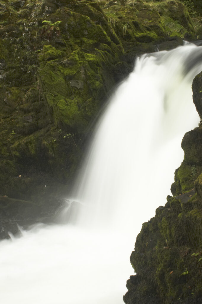 England, Cumbria, Lake District National Park. The fast flowing cascades of Skelwith Force near Skelwith Bridge.