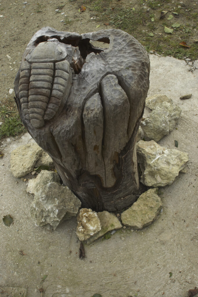 England, Shropshire, Wenlock Edge. Sculpture of a Trilobite, located near woodland in this National Trust area near Much Wenlock and the West Midlands.