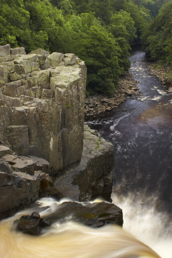England, County Durham, High Force. The River Tees cascades down the High Force waterfall in County Durham.