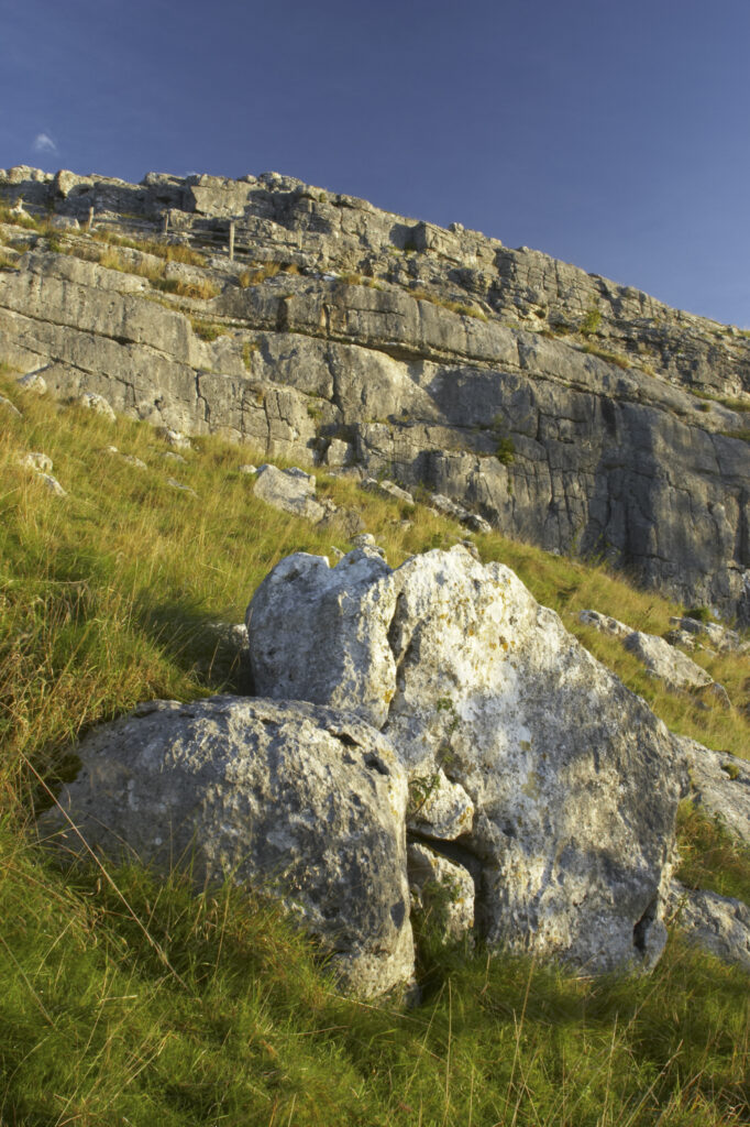 England, Yorkshire, Yorkshire Dales National Park. The impressive natural rock formations / geology of the limestone features of Malham Cove in the Yorkshire Dales National Park