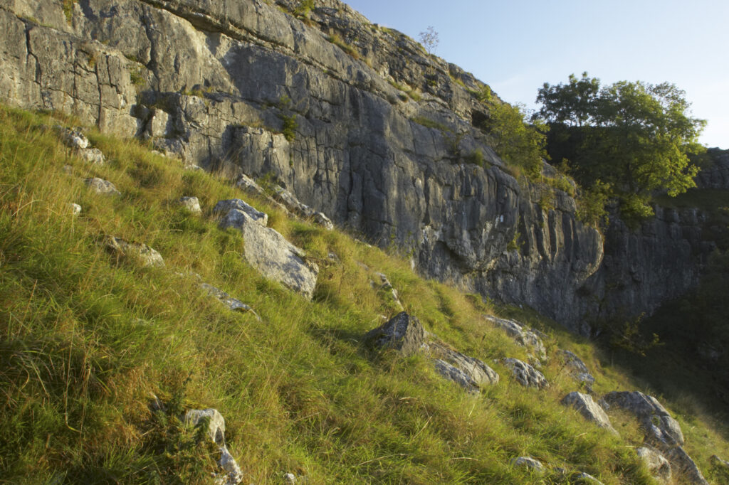 England, Yorkshire, Yorkshire Dales National Park. The impressive natural rock formations / geology of the limestone features of Malham Cove in the Yorkshire Dales National Park