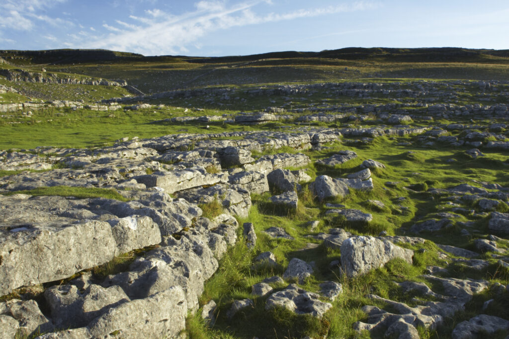 England, Yorkshire, Yorkshire Dales National Park. The impressive natural rock formations / geology of limestone paving above Malham Cove in the Yorkshire Dales National Park, in Yorkshire.