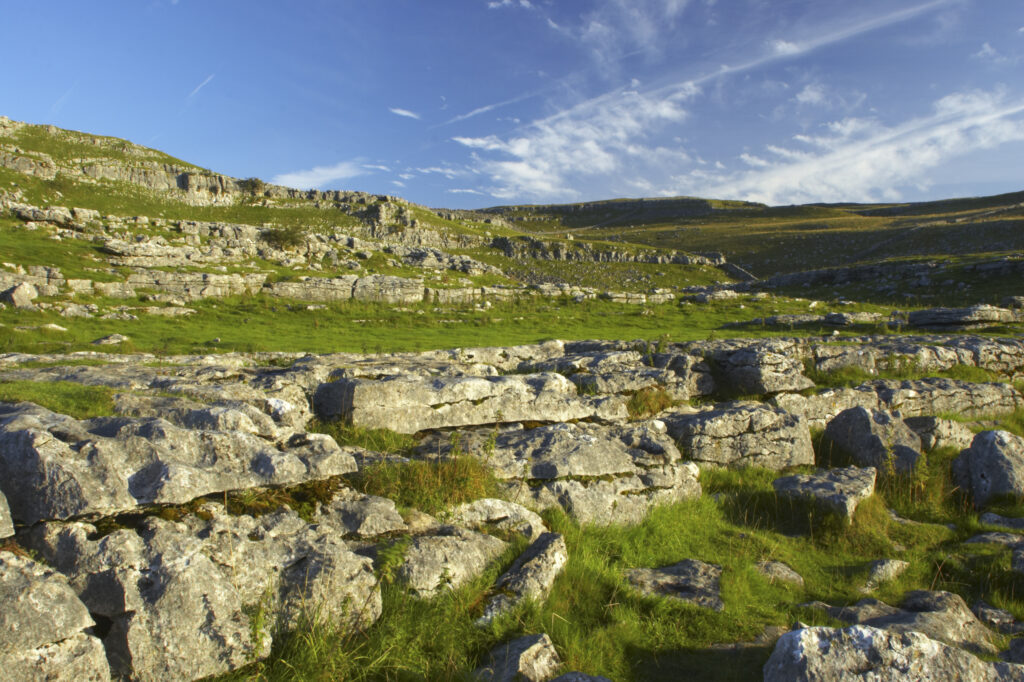 England, Yorkshire, Yorkshire Dales National Park. The impressive natural rock formations / geology of limestone paving above Malham Cove in the Yorkshire Dales National Park, in Yorkshire.