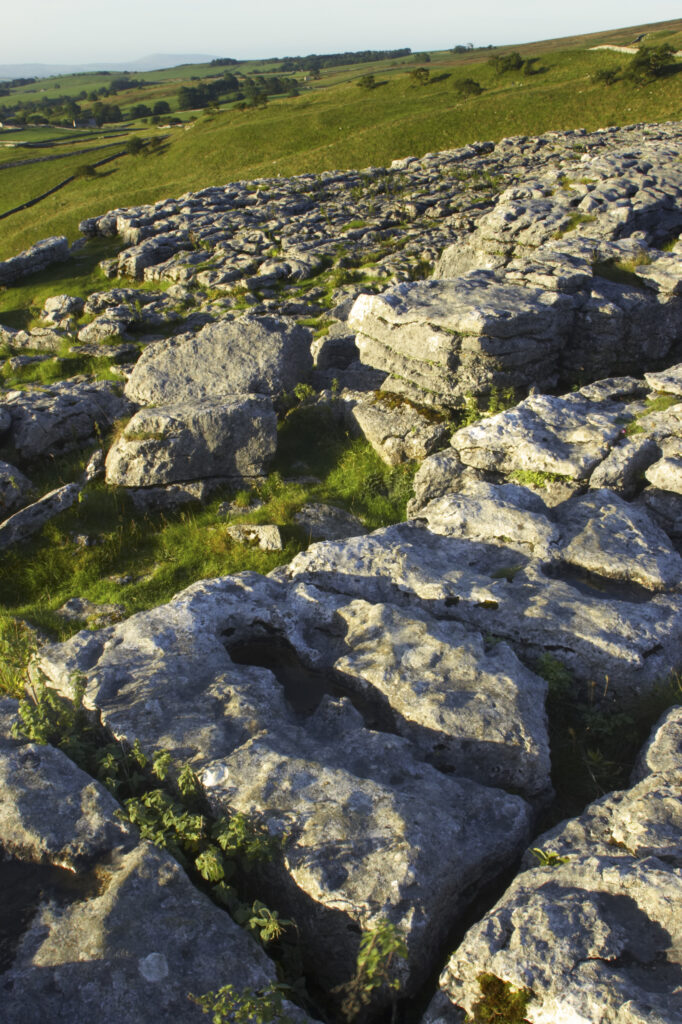 England, Yorkshire, Yorkshire Dales National Park. The impressive natural rock formations / geology of limestone paving above Malham Cove in the Yorkshire Dales National Park, in Yorkshire.