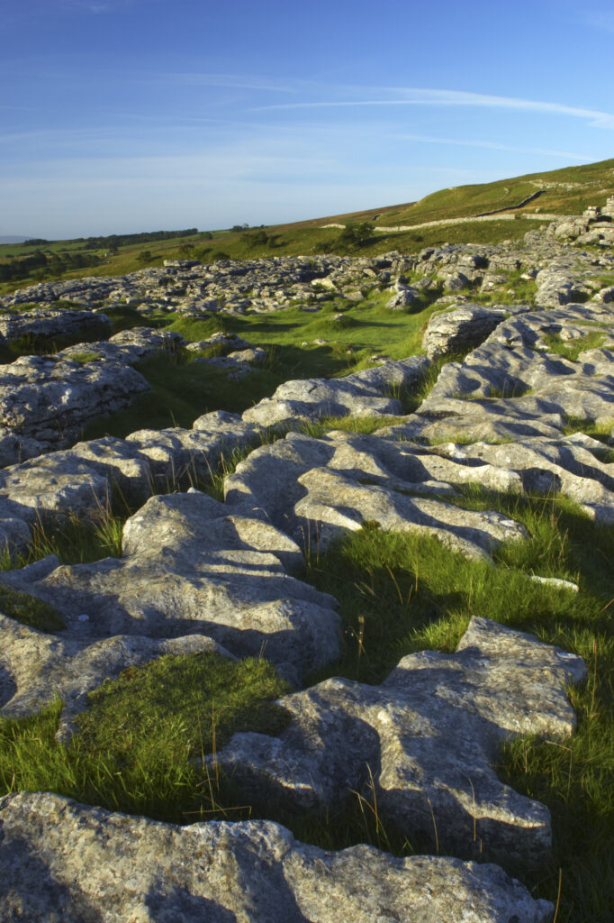 England, Yorkshire, Yorkshire Dales National Park. The impressive natural rock formations / geology of limestone paving above Malham Cove in the Yorkshire Dales National Park, in Yorkshire.
