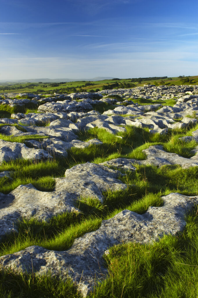 England, Yorkshire, Yorkshire Dales National Park. The impressive natural rock formations / geology of limestone paving above Malham Cove in the Yorkshire Dales National Park, in Yorkshire.