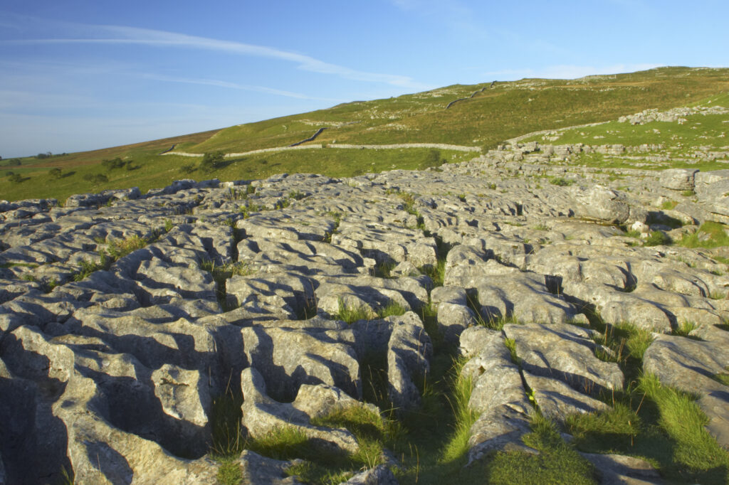 England, Yorkshire, Yorkshire Dales National Park. The impressive natural rock formations / geology of limestone paving above Malham Cove in the Yorkshire Dales National Park, in Yorkshire.