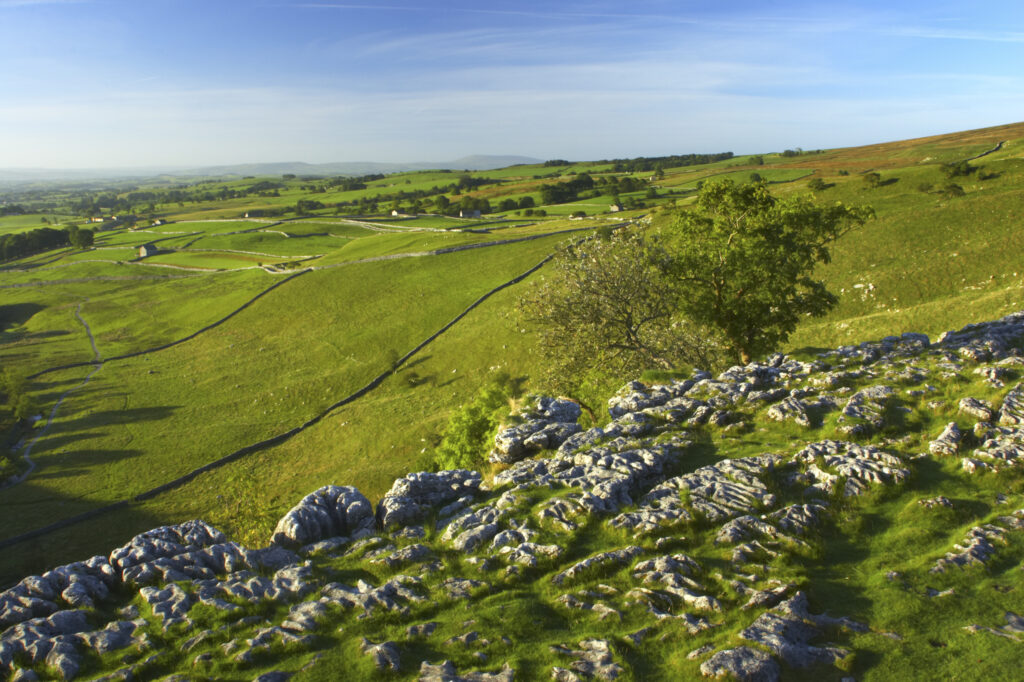 England, Yorkshire, Yorkshire Dales National Park. The impressive natural rock formations / geology of limestone paving above Malham Cove in the Yorkshire Dales National Park, in Yorkshire.