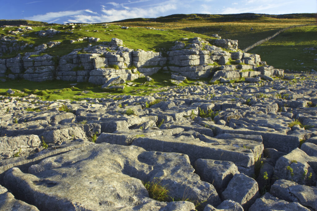 England, Yorkshire, Yorkshire Dales National Park. The impressive natural rock formations / geology of limestone paving above Malham Cove in the Yorkshire Dales National Park, in Yorkshire.