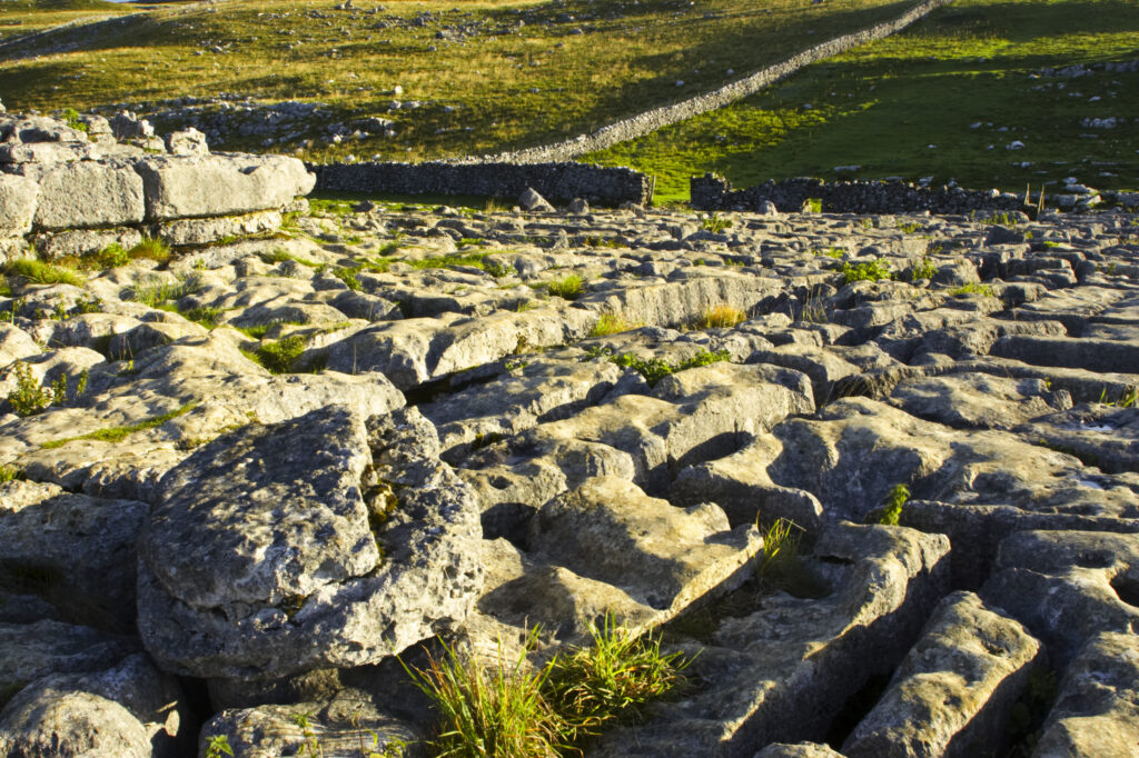 England, Yorkshire, Yorkshire Dales National Park. The impressive natural rock formations / geology of limestone paving above Malham Cove in the Yorkshire Dales National Park, in Yorkshire.