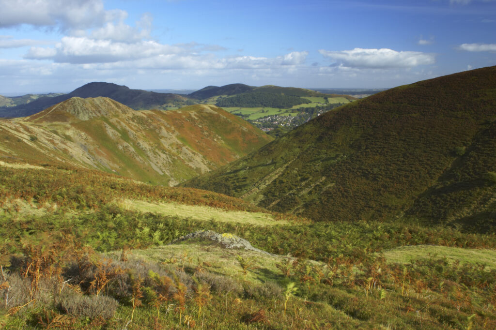 England, Shropshire, The Long Mynd. View from the Long Mynd in early autumn looking across the green and red expanse of this popular hiking and gliding plateau in the west midlands.
