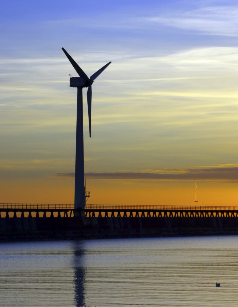 England, Northumberland, Blyth offshore wind farm. Dawn, looking towards the wind turbines generating renewable electricity.