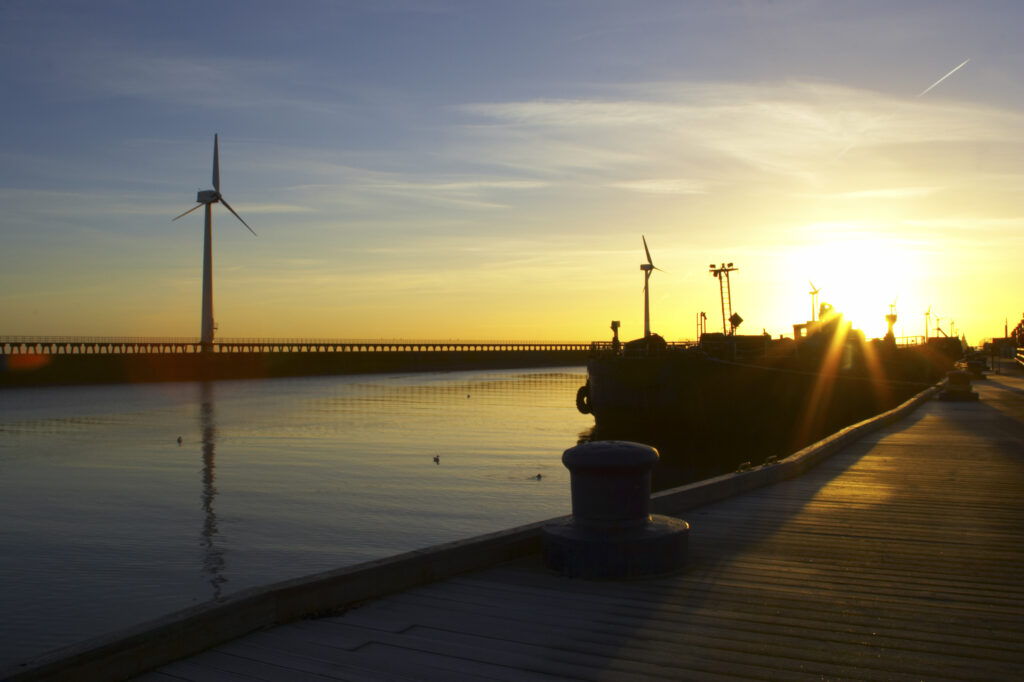 England, Northumberland, Blyth offshore wind farm. Dawn, looking towards the wind turbines generating renewable electricity.