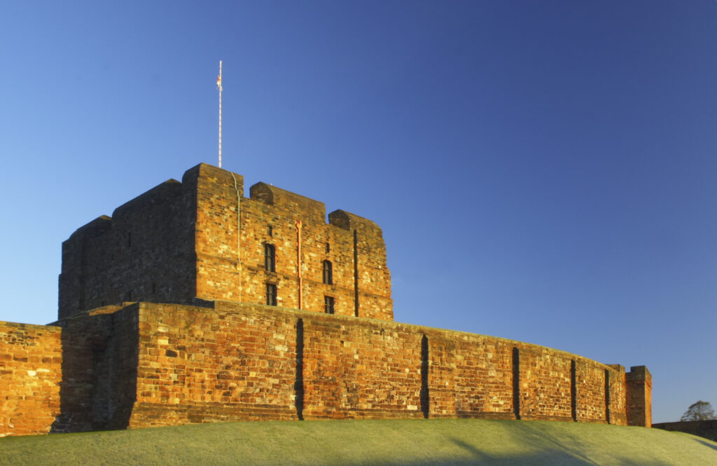 England, Cumbria, Carlisle Castle. Early morning winter sun illuminates the red sandstone of Carlisle Castle.