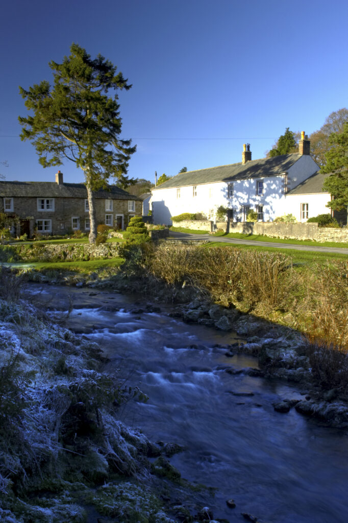 England, Cumbria, Lake District National Park. The gentle flow of the Cald beck, running through Caldbeck village.