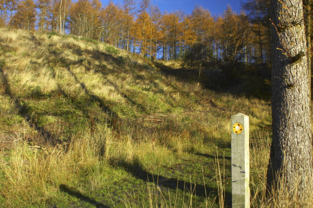 England, Cumbria, Caldbeck. Sign indicating the route towards Parsons Park Wood.
