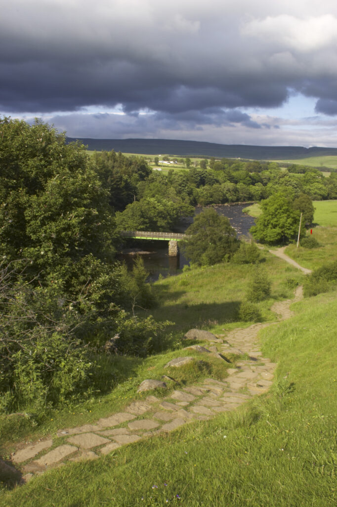 England, County Durham, River Tees. The River Tees and the north Pennines, downstream of the High Force falls in County Durham.