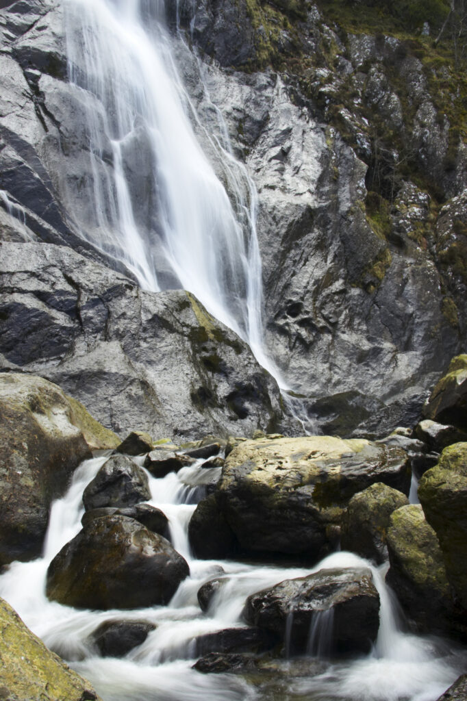 Wales, Caernarfonshire, Snowdonia National Park. The dramatic Aber Falls, within the Coedydd Aber National Nature Reserve.