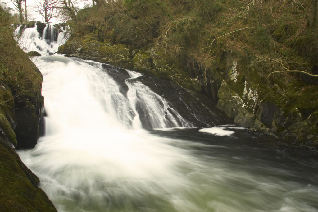 Wales, Caernarfonshire, Snowdonia National Park. The popular Swallow Falls, located near to the town of Betws-y-Coed.