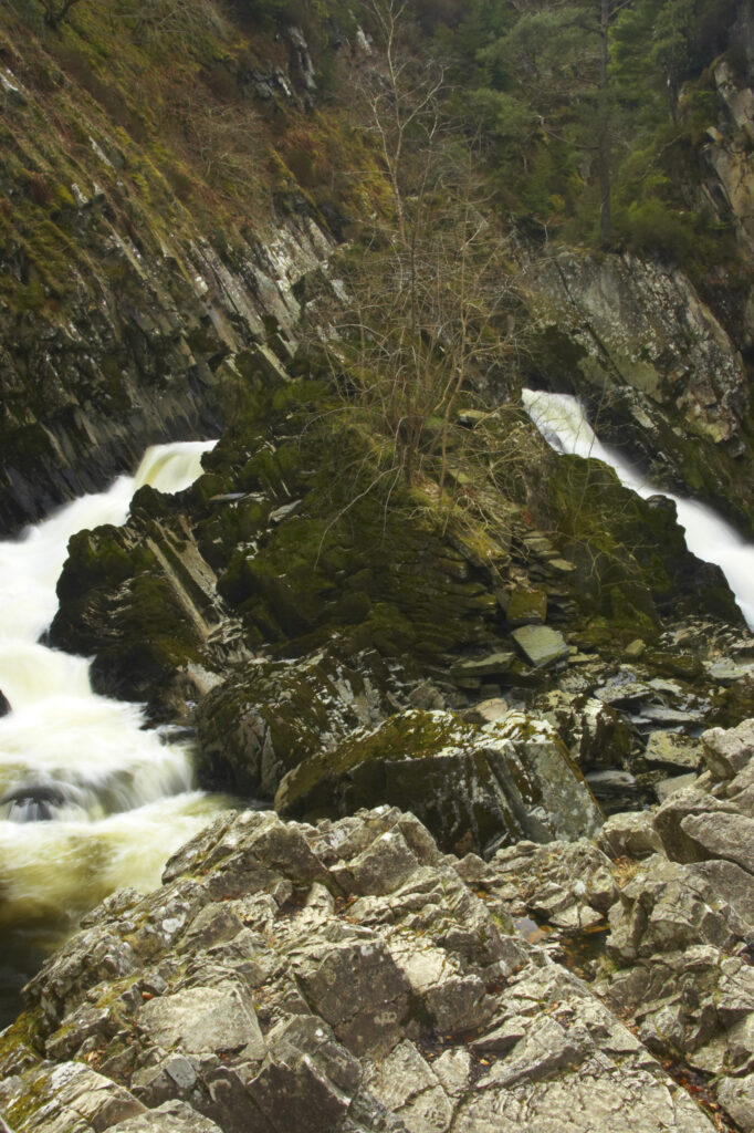 Wales, Caernarfonshire, Snowdonia National Park. The fast flowing waters of the Conwy Falls.