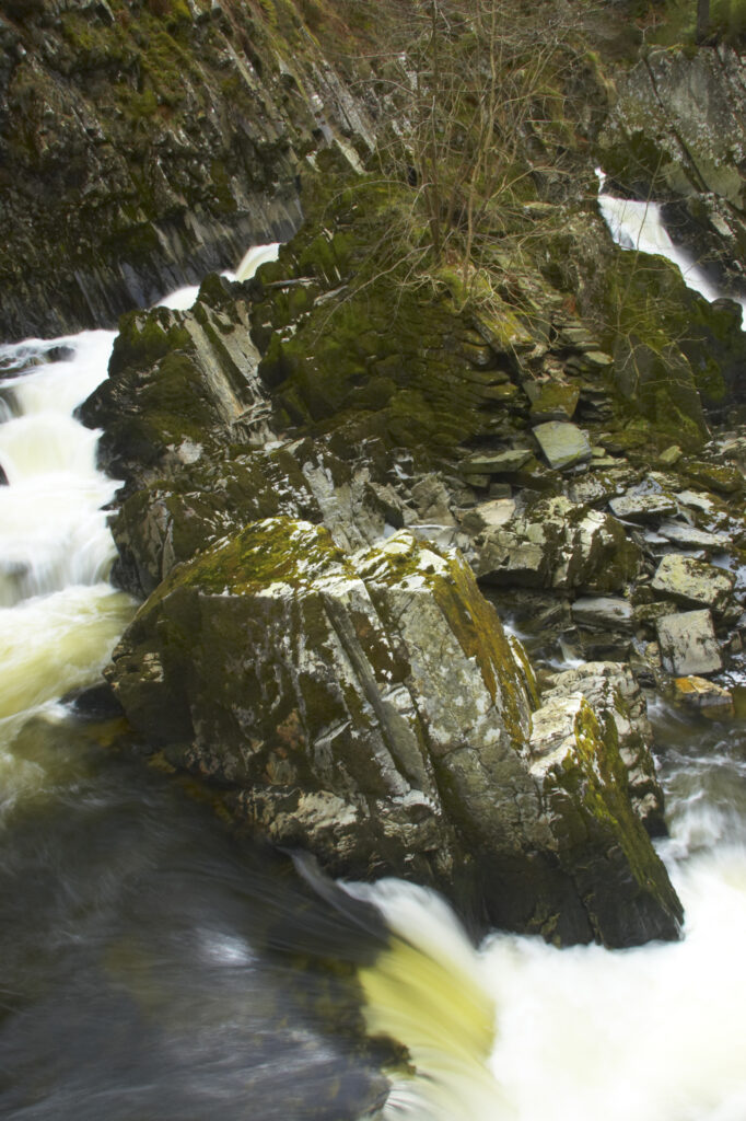 Wales, Caernarfonshire, Snowdonia National Park. The fast flowing waters of the Conwy Falls.