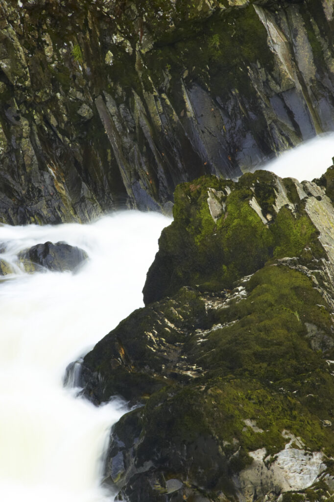 Wales, Caernarfonshire, Snowdonia National Park. The fast flowing waters of the Conwy Falls.