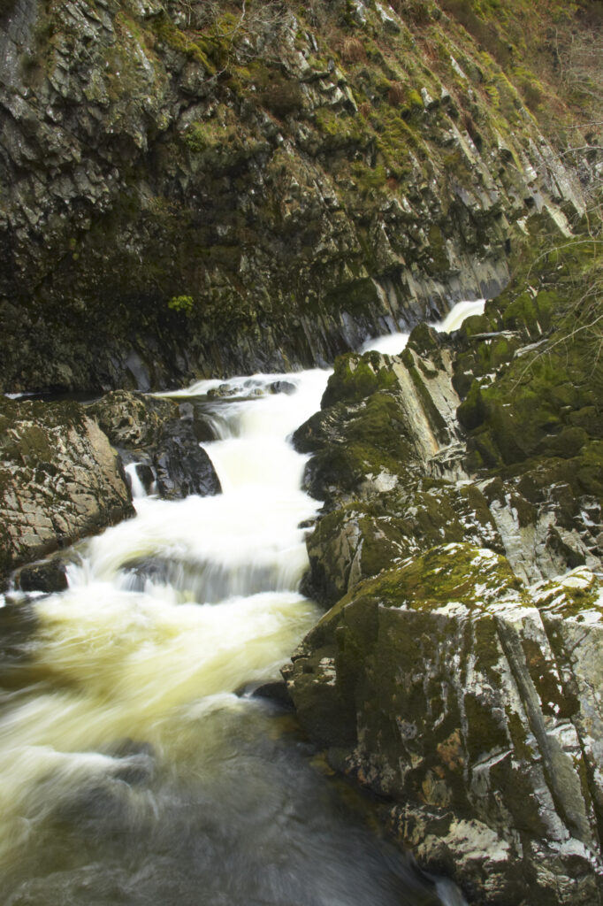 Wales, Caernarfonshire, Snowdonia National Park. The fast flowing waters of the Conwy Falls.