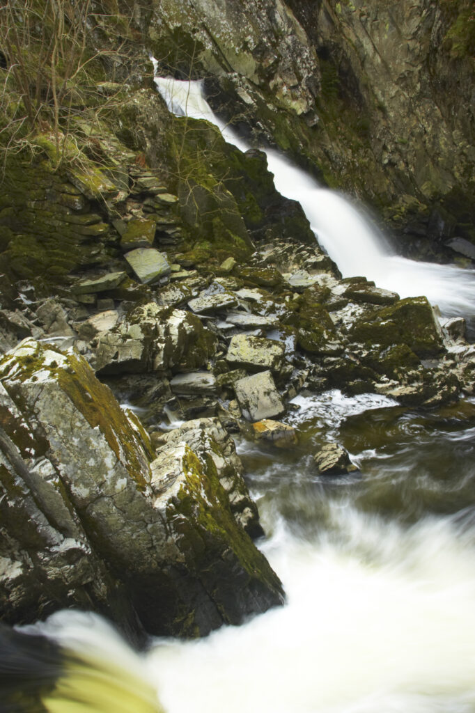 Wales, Caernarfonshire, Snowdonia National Park. The fast flowing waters of the Conwy Falls.