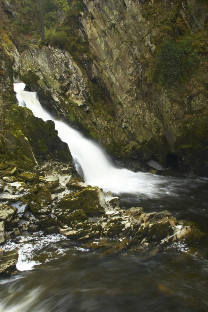 Wales, Caernarfonshire, Snowdonia National Park. The fast flowing waters of the Conwy Falls.