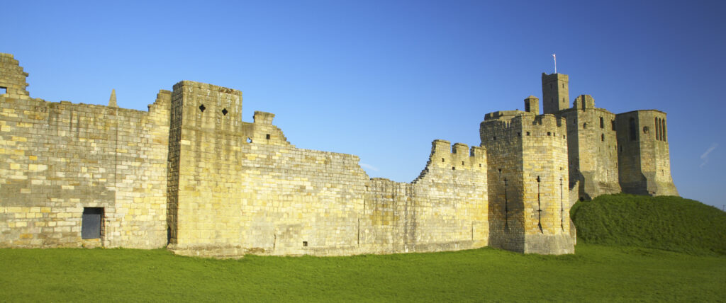 England, Northumberland, Warkworth Castle. Warkworth Castle (English Heritage), a magnificent 12th century stone motte and bailey fortress, located near the Northumberland Heritage Coast.