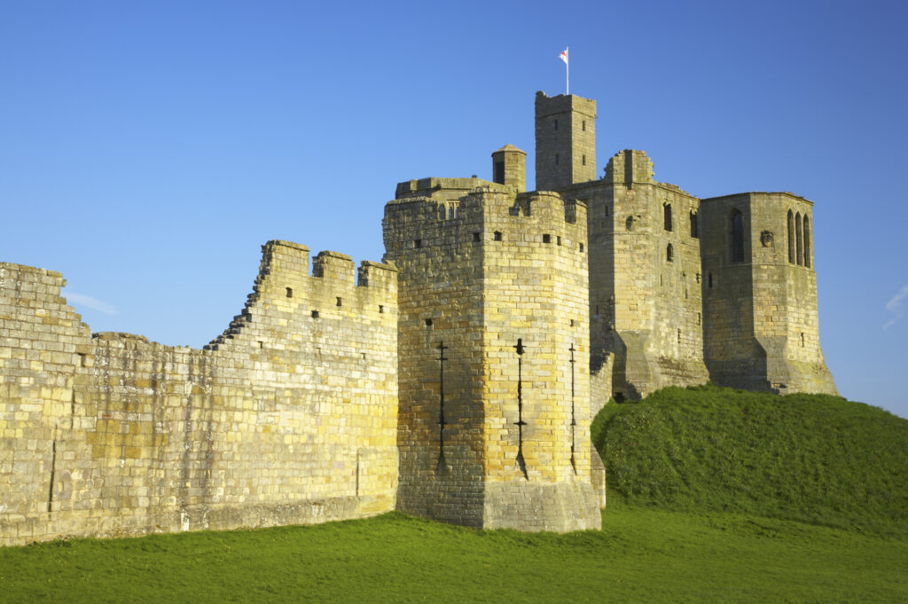 England, Northumberland, Warkworth Castle. Warkworth Castle (English Heritage), a magnificent 12th century stone motte and bailey fortress, located near the Northumberland Heritage Coast.