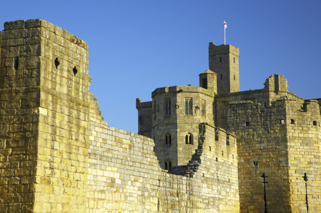 England, Northumberland, Warkworth Castle. Warkworth Castle (English Heritage), a magnificent 12th century stone motte and bailey fortress, located near the Northumberland Heritage Coast.