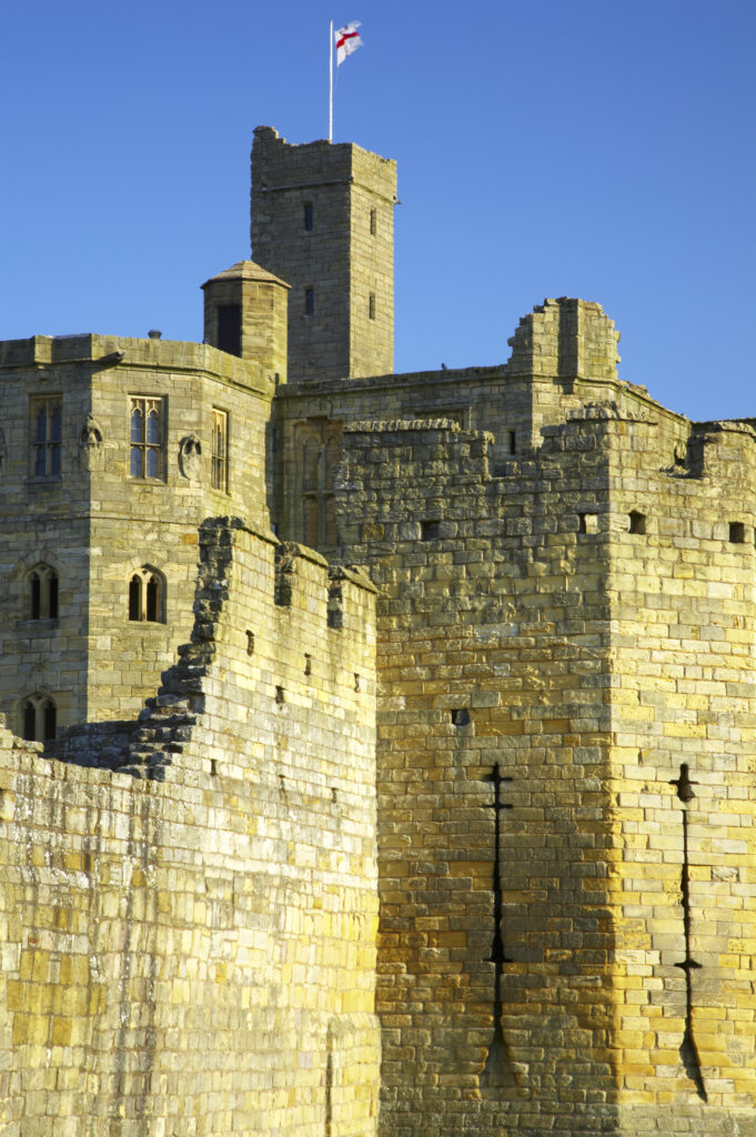 England, Northumberland, Warkworth Castle. Warkworth Castle (English Heritage), a magnificent 12th century stone motte and bailey fortress, located near the Northumberland Heritage Coast.