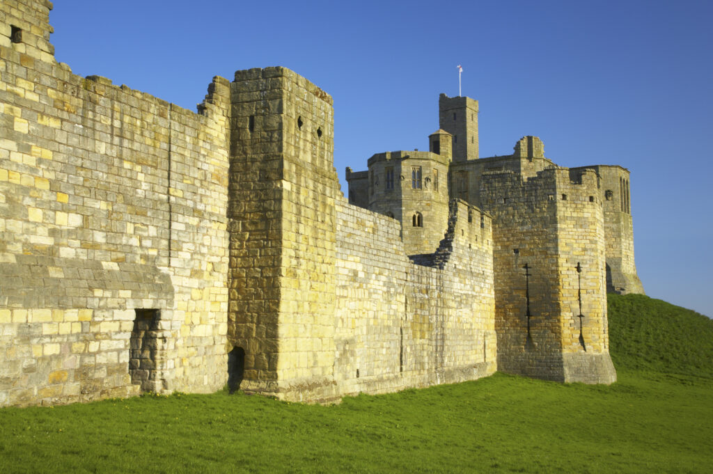 England, Northumberland, Warkworth Castle. Warkworth Castle (English Heritage), a magnificent 12th century stone motte and bailey fortress, located near the Northumberland Heritage Coast.