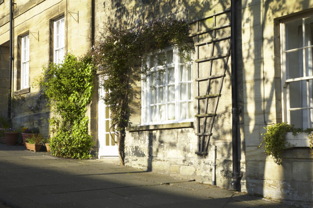 England, Northumberland, Warkworth. A row of terraced houses in Warkworth Village, located near the Northumberland Heritage Coast.