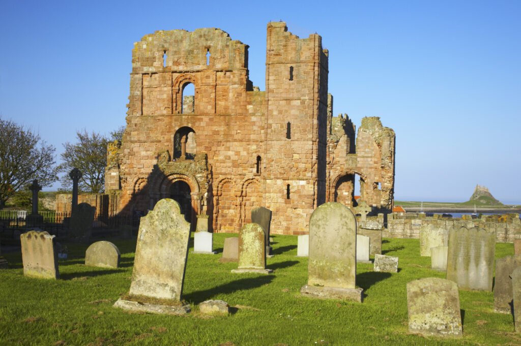 England, Northumberland, Lindisfarne / Holy Island. The ruins of the Lindisfarne Priory, located upon Holy Island along the Northumberland Heritage Coast.