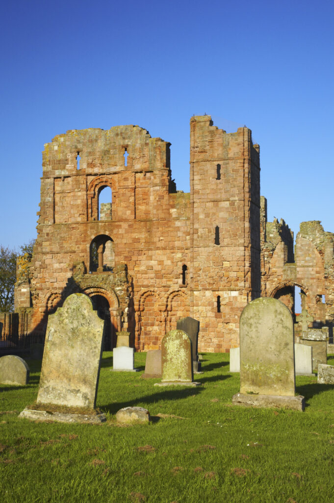 England, Northumberland, Lindisfarne / Holy Island. The ruins of the Lindisfarne Priory, located upon Holy Island along the Northumberland Heritage Coast.
