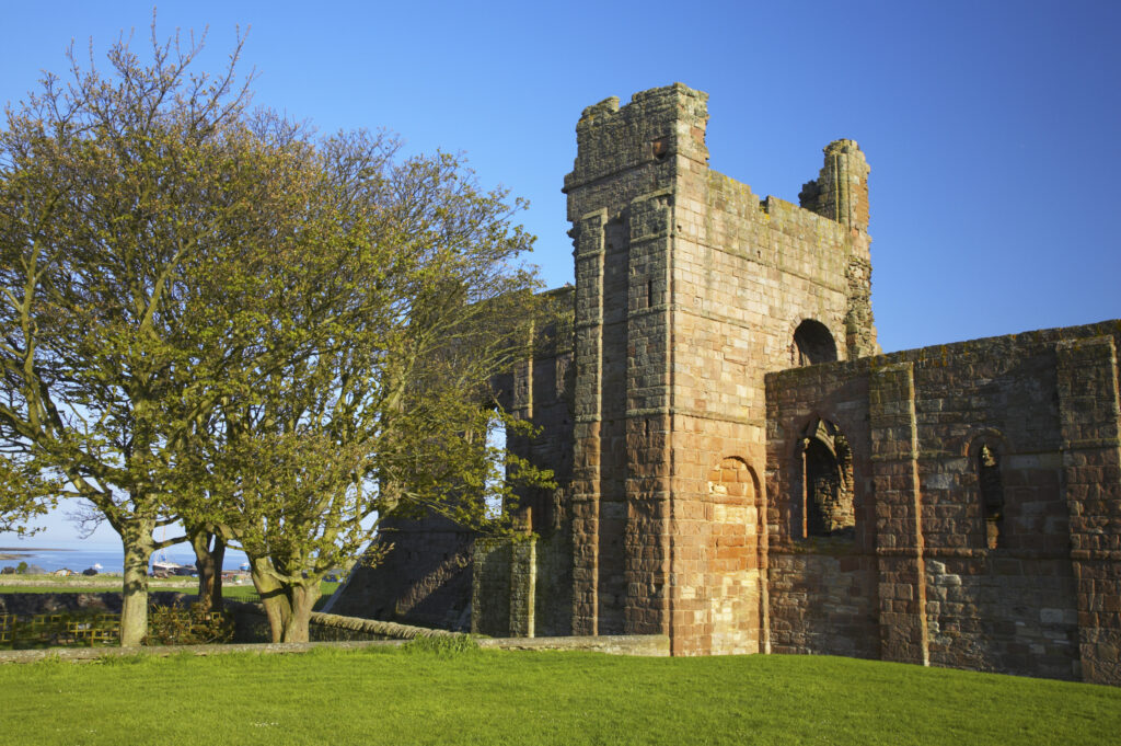 England, Northumberland, Lindisfarne / Holy Island. Remains of the Lindisfarne Priory, located upon Holy Island along the Northumberland Heritage Coast.