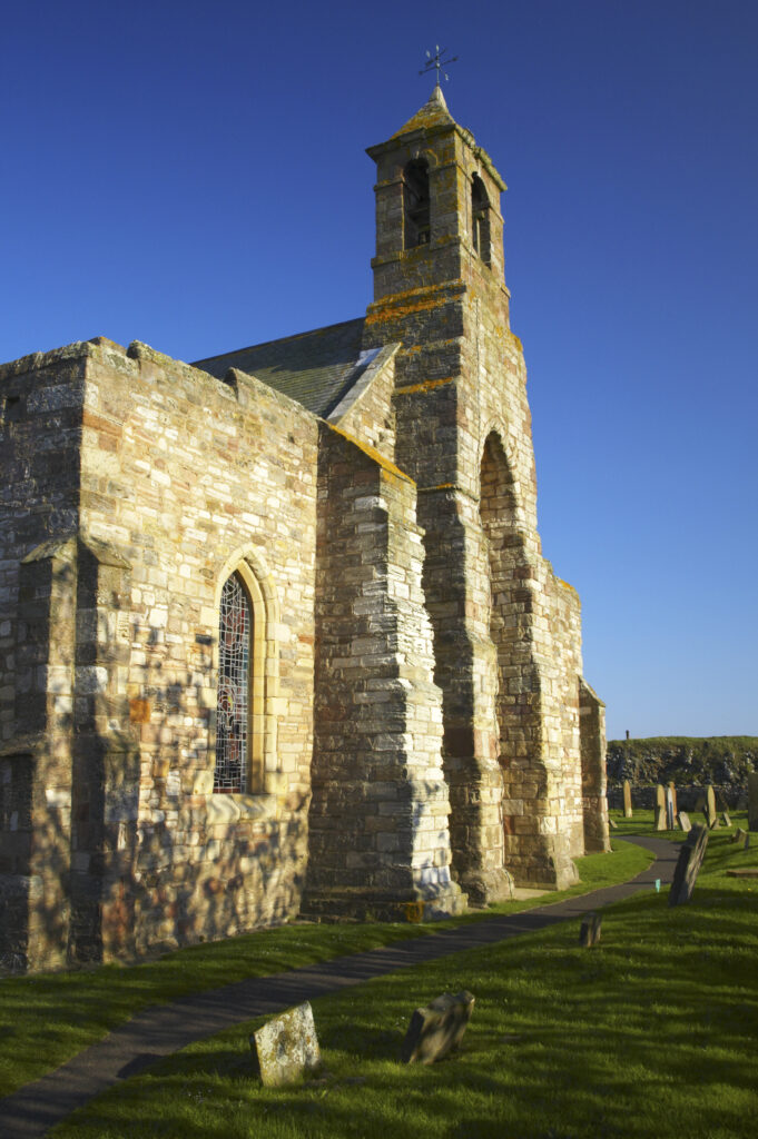 England, Northumberland, Lindisfarne / Holy Island. The church of St Mary the Virgin, located upon Holy Island, part of the Northumberland Heritage Coast.