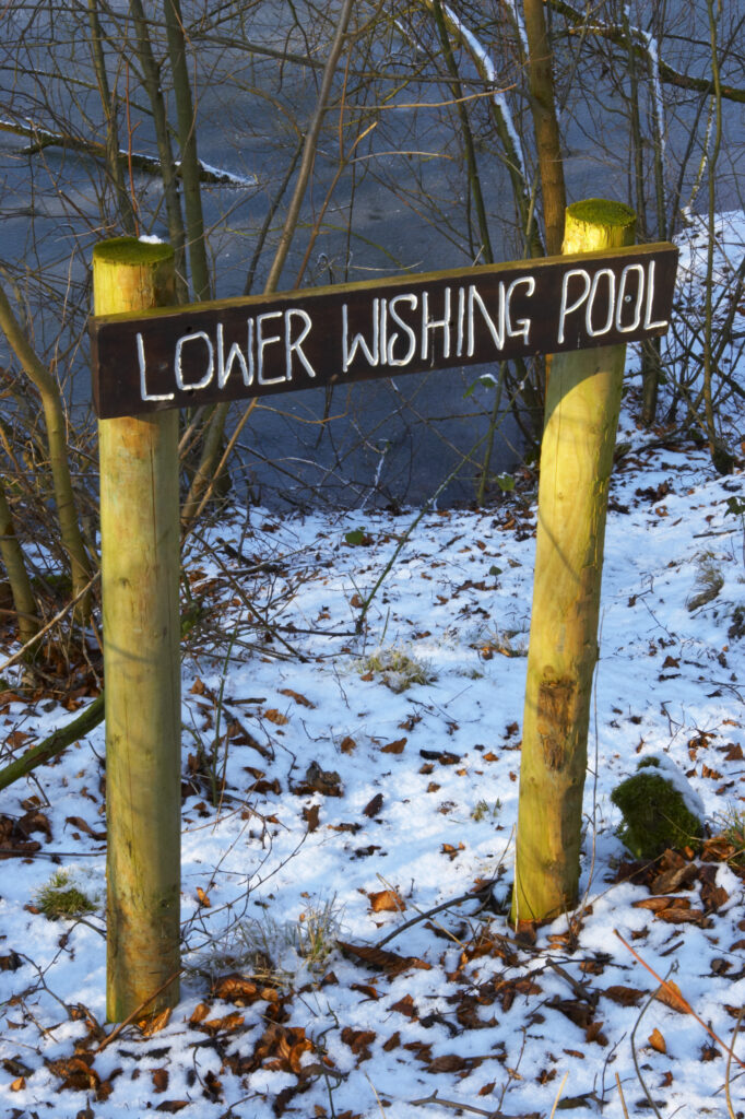 ENGLAND West Midlands Baggeridge Country Park A rustic sign for lower wishing pool located in the popular country park.