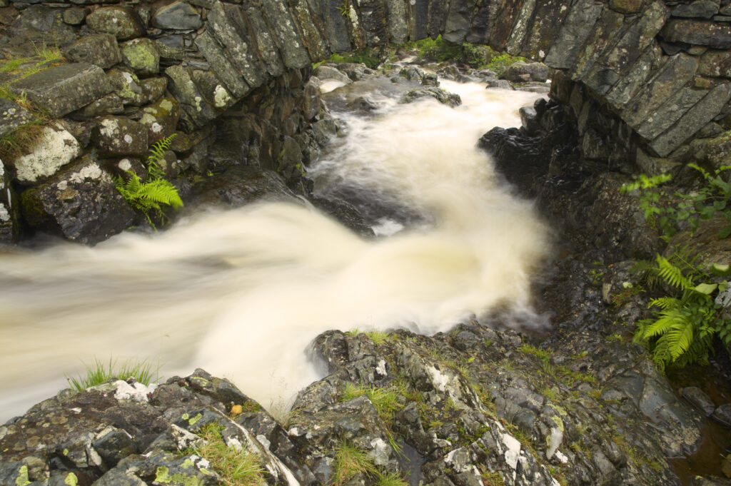 England, Cumbria, Lake District National Park. Ashness Bridge and the fast rapids of the Barrow Beck