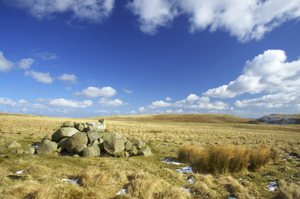 England, Northumberland, Northumberland National Park. A winter scene with a cairn of rocks / boulders found at the foothills of the Cheviots and the Breamish valley near the village of Ingram situated within the Northumberland National Park in the northen england county of Northumberland about 8km east of the border with Scotland.